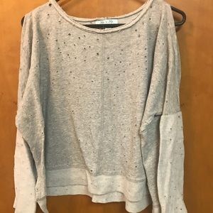 Cold shoulder sweater